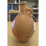 An 'antique' salt glazed bellarmine style jug  10"h