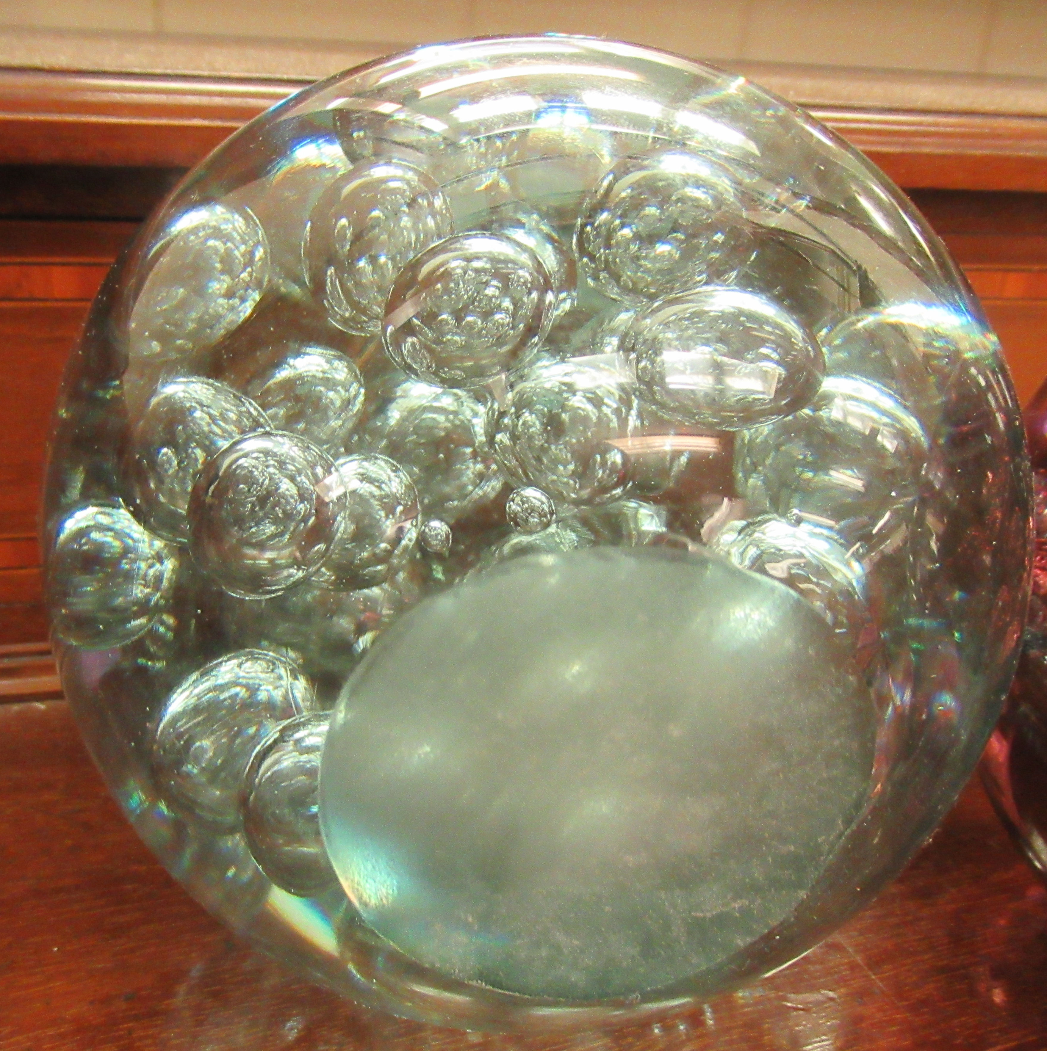 A set of three variously coloured glass doorstops with bubbled decoration  5.5"dia - Image 3 of 3