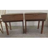 A pair of teak Europa furniture single drawer bedside chests, raised on square legs  22"h  20"w