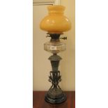 A late 19thC Spelter oil lamp with a clear glass reservoir  20"h