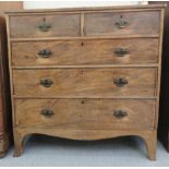 An early 19thC mahogany dressing chest, the top with a reeded edge over two short/three graduated