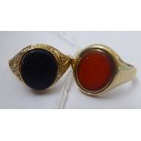 Two 9ct gold signet rings, set with coloured stones