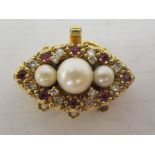 An 18ct gold clasp, set with pearls, rubies and diamonds