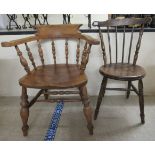 An early 20thC oak, beech and elm framed captains chair; and a later beech and elm framed chair