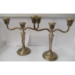 A pair of loaded silver, twin handled pedestal candelabra  Birmingham marks  8.5"h