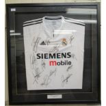 A Real Madrid 2003-2004 football shirt  bears various signatures  35" x 31.5"  framed