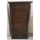 A mid/late 19thC oak, seven drawer wellington chest, on a plinth  42"h  25"w