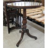 A William IV mahogany pedestal table, raised on a ring turned column and a splayed tripod base  27"h