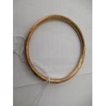 A 9ct gold hollow bangle