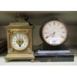 An early 20thC mantel timepiece; faced by a Roman dial  6.5"h; and a later brass cased carriage