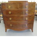 An early 19thC mahogany bow front dressing chest, comprising two short/three graduated long drawers,