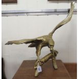 A modern gilt sprayed brass model, an eagle  22"h with a 28" wingspan