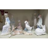 Lladro and Nao porcelain figures and model animals: to include a seated rabbit  5"h