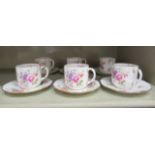 A set of six Royal Crown Derby bone china Derby Poses pattern cups and saucers