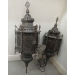 Two Middle Eastern inspired cast metal pendant centre lights with pierced stylised ornament  31" &