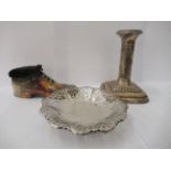 Silver collectables, viz. a shallow dish  4"dia; a loaded candlestick  4.5"h; and a novelty pin