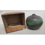 A Kyoto studio pottery vase of squat bulbous form, decorated with sponged parallel green and black