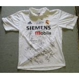 A circa 2000-2003 Real Madrid official Adidas shirt, signed by the squad  size M  unframed