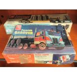 An AMT Loadcraft model lowboy drop deck, low bed trailer, 1:25 scale model kit; and another
