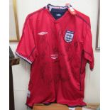 A 2002 England V Argentina official Umbro shirt, signed by the squad  size XL  unframed