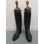 A pair of pre-1950s hide, military riding boots with wooden shoe lasts  11"L