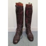 A pair of pre-1950s hide, military riding boots with wooden shoe lasts  11"L