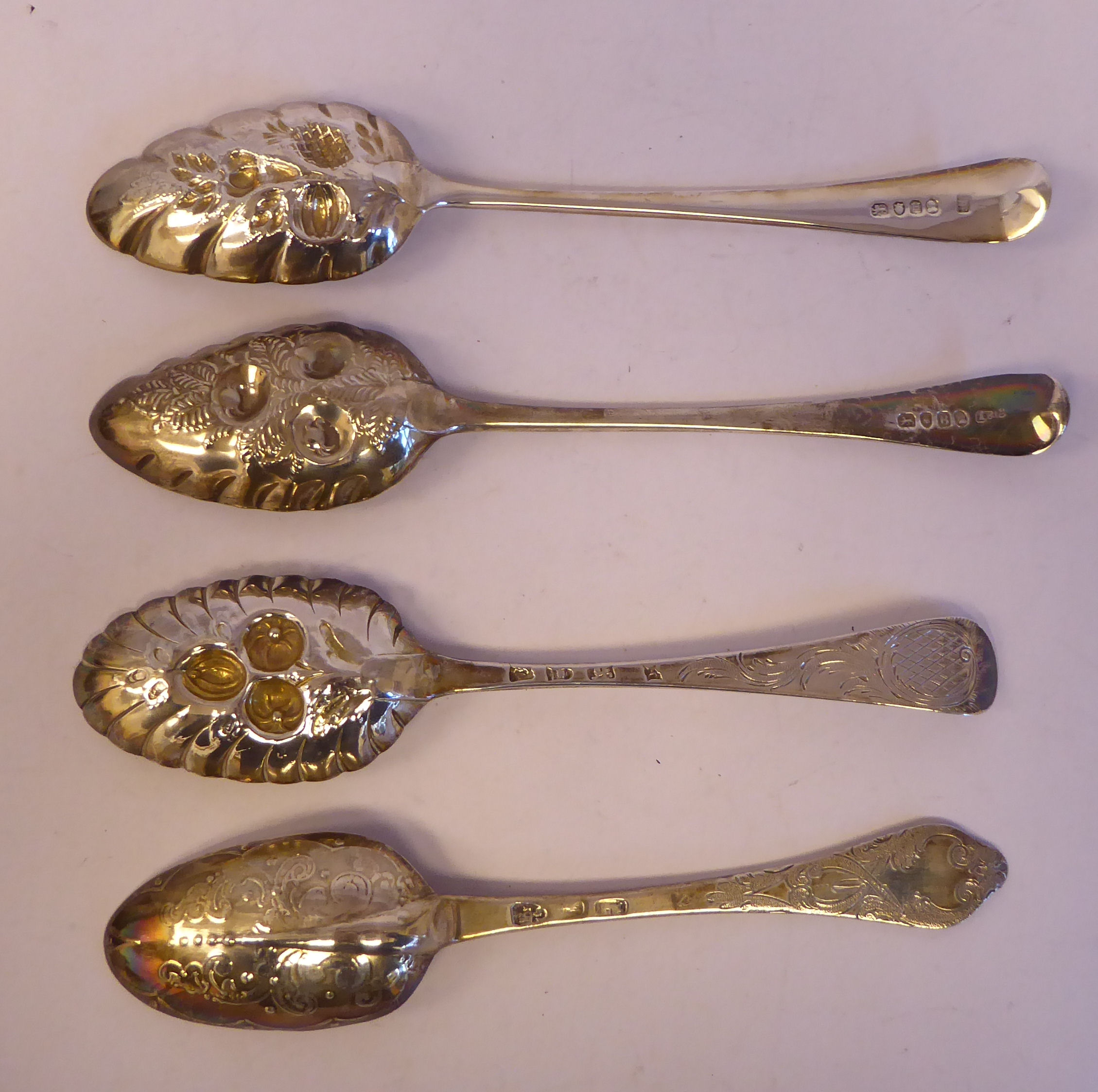 Four similar late 18th/early 19thC variously decorated, silver berry spoons  mixed marks - Image 2 of 5