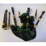 A set of vintage hardwood and ivory mounted bagpipes, the chanter stamped DnMcDougall,