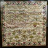 An early 19thC needlework sampler, the work of one Judith Barham, aged 12, featuring four lines of