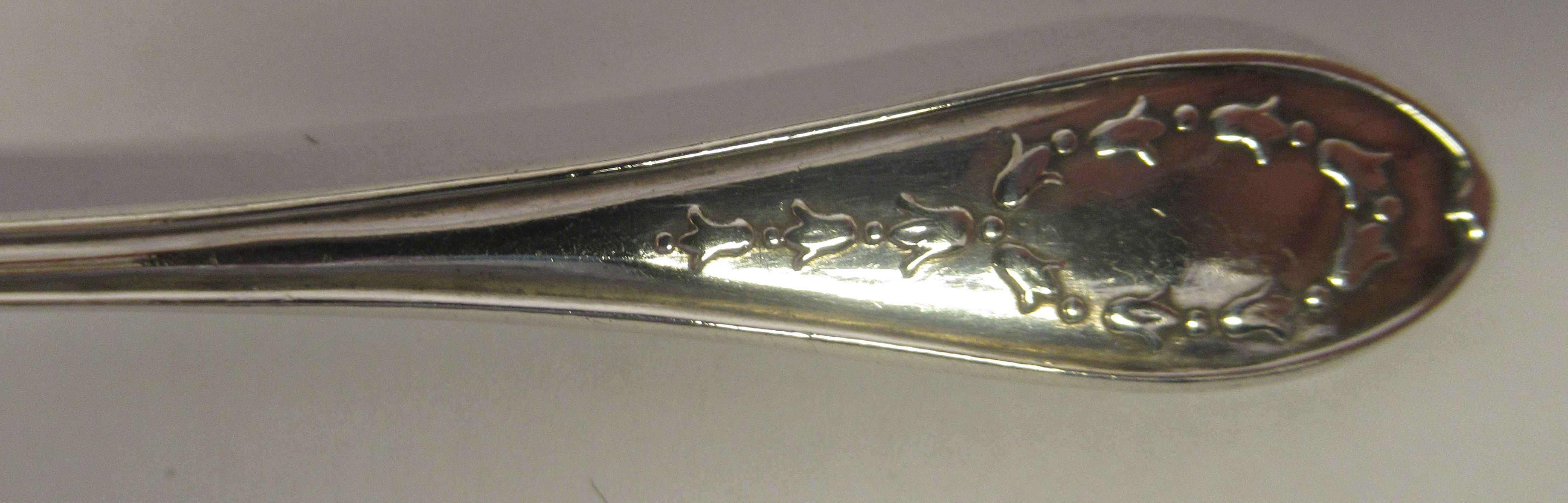 A set of twelve silver teaspoons and a pair of matching sugar tongs with cast bellflower ornament - Image 3 of 4