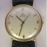 An Omega 9ct gold cased wristwatch, the automatic movement with sweeping seconds, faced by an