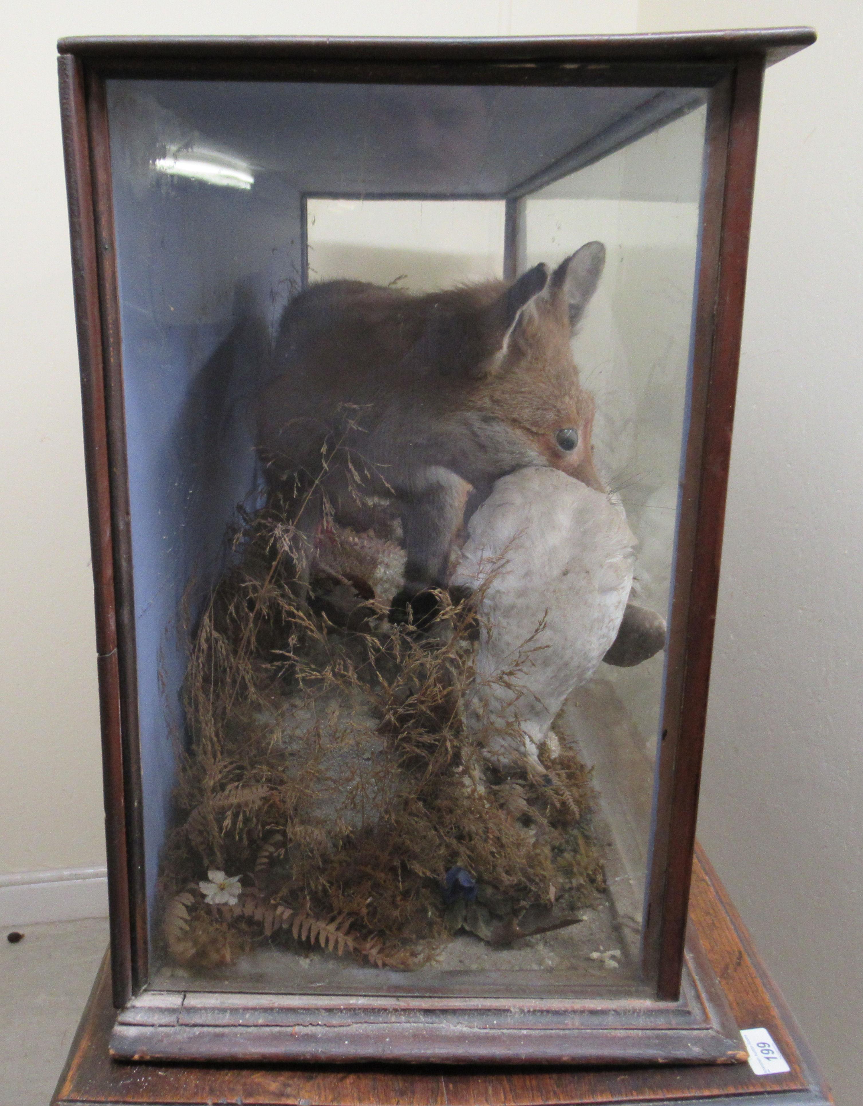 Taxidermy - a late 19th/early 20thC fox with captured prey, displayed in a naturalistic setting - Image 4 of 5