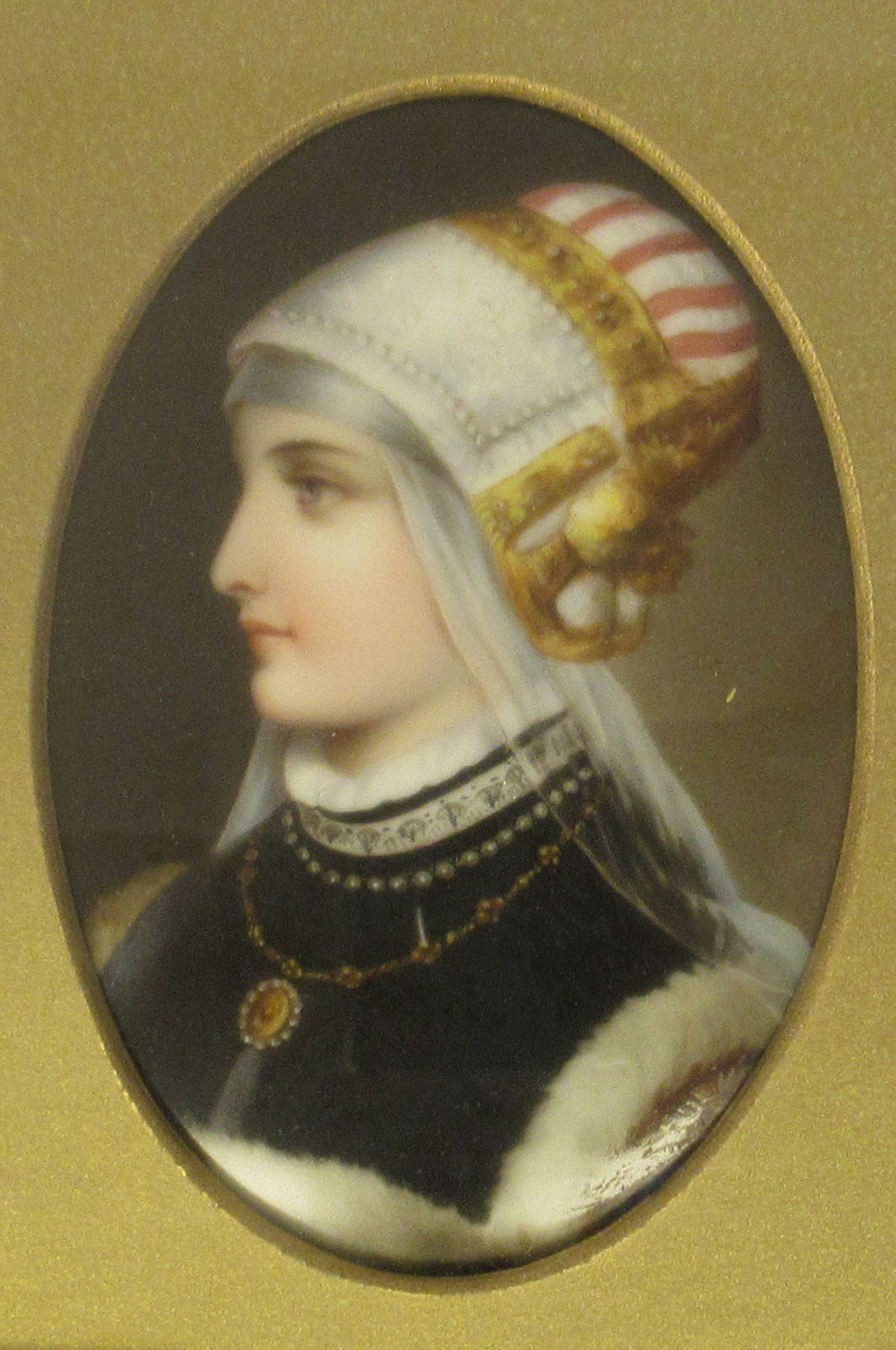 A late 19thC framed painted porcelain oval head and shoulders profile portrait miniature, a young - Image 2 of 5