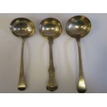 Two similar George VII silver Old English pattern sauce ladles with oval bowls  IL & JM  London 1807