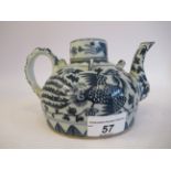 A Provincial Chinese porcelain teapot of squat, circular form, having a cover, loop handle and swept