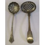 A George III silver fiddle pattern sifter spoon, the shallow, oval bowl with uniform perforations