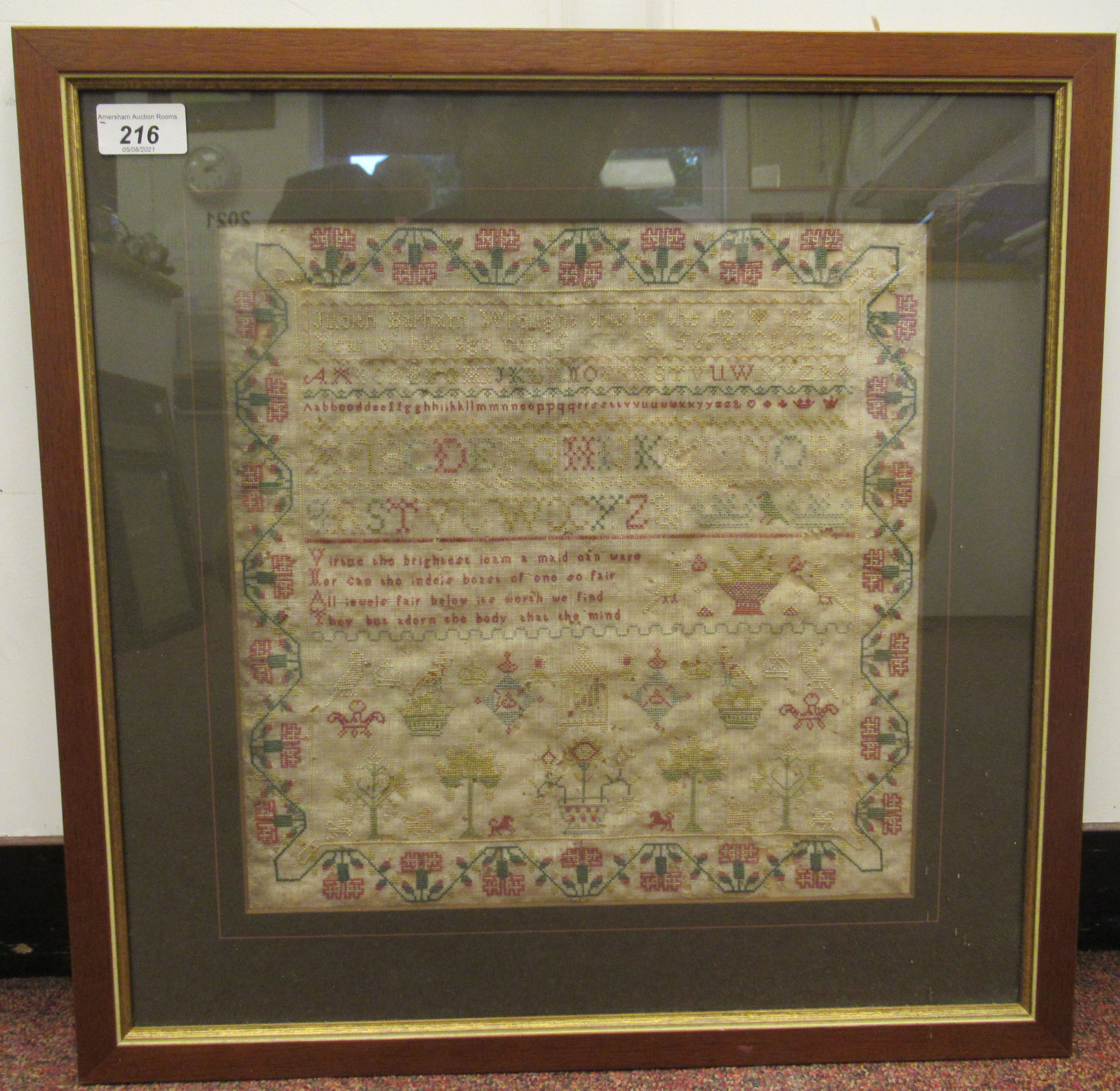 An early 19thC needlework sampler, the work of one Judith Barham, aged 12, featuring four lines of - Image 2 of 4