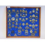 Approx. fifty military cap badges and other insignia, some copies: to include The Dorsetshire,