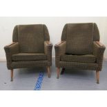 A pair of 1960/70s three tone, textured fabric upholstered, low, enclosed armchairs with panelled