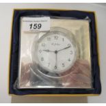 A 2001 silver mounted timepiece, faced by an Arabic dial  4"sq  boxed