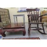 A modern fruitwood rocking chair with a slatted back and solid seat, raised on turned legs; and a