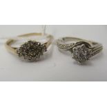 A 9ct white gold crossover set diamond cluster ring; and another similar