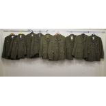 Nine Army dress tunics, some bearing labels, some with matching trousers  various sizes