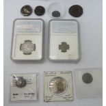 Two Numismatic Guaranty Corporation coins, viz. a Roman Empire coin, circa 96-98 AD; and a Kingdom