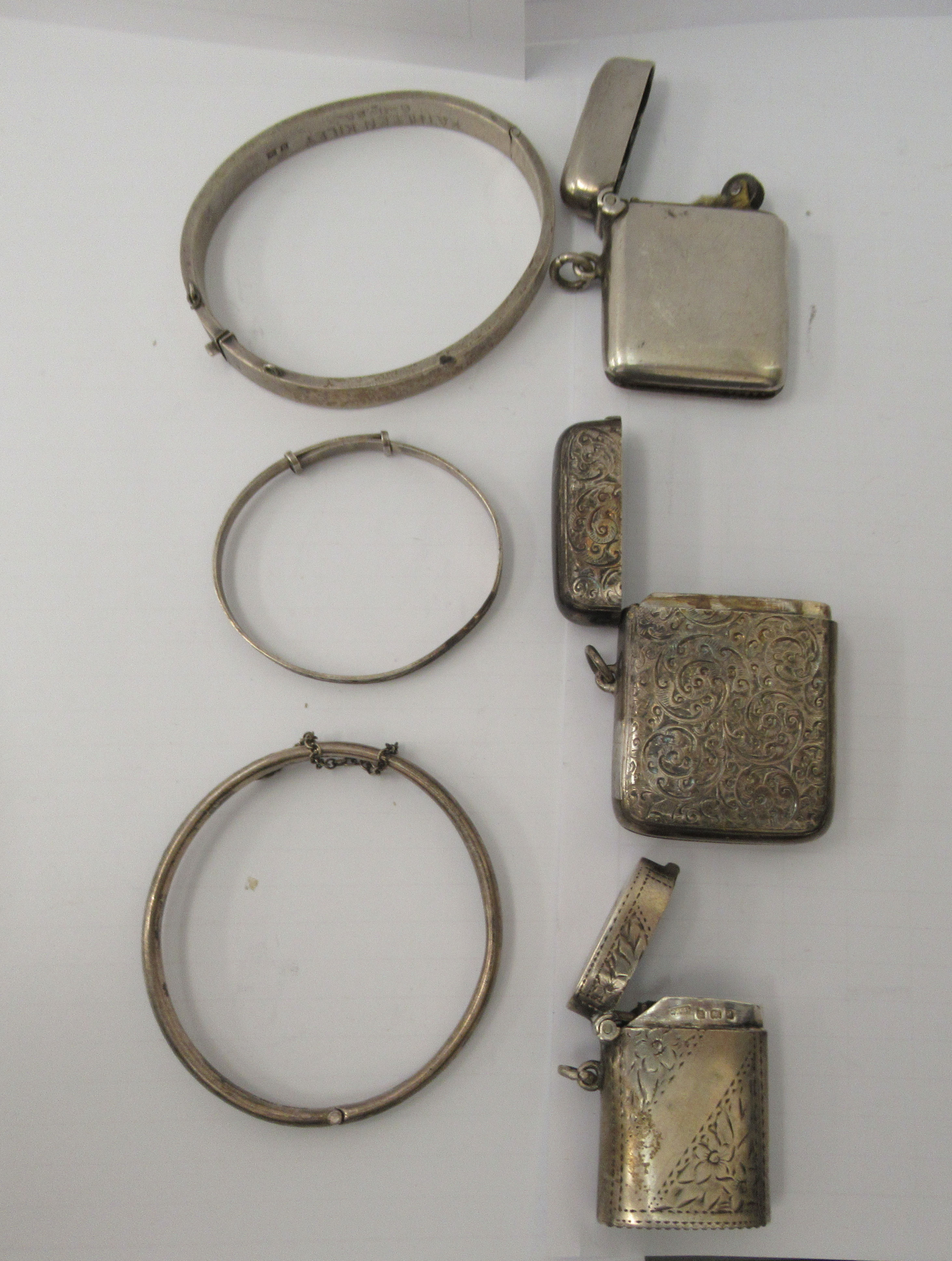 Three similar late 19th/early 20thC variously decorated silver vesta cases with strike plates, - Image 2 of 6