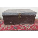 An early/mid 20thC steel trunk with straight sides and a hinged lid  12"h  26"w