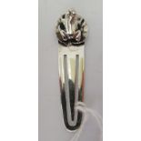 A silver bookmark with a frog finial  indistinct marks