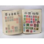 A 'schoolboys' uncollated album collection of postage stamps: to include British Empire and