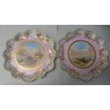 A pair of late 19thC porcelain plates, each decorated with loch scenes  9"dia