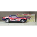 A 1969 Rusher Z28 Camaro bump-n-Go tinplate, battery powered model car  boxed